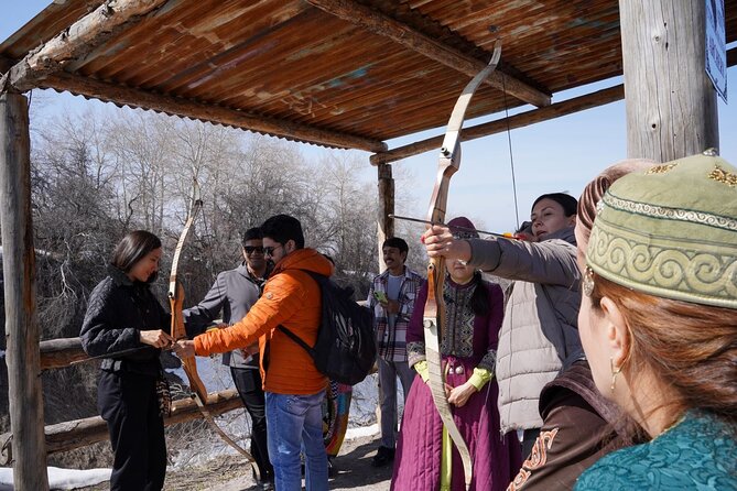 Kazakh Ethno-Village Tour - Trying archery after lunch