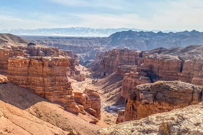 The red walls of Charyn Canyon above the river