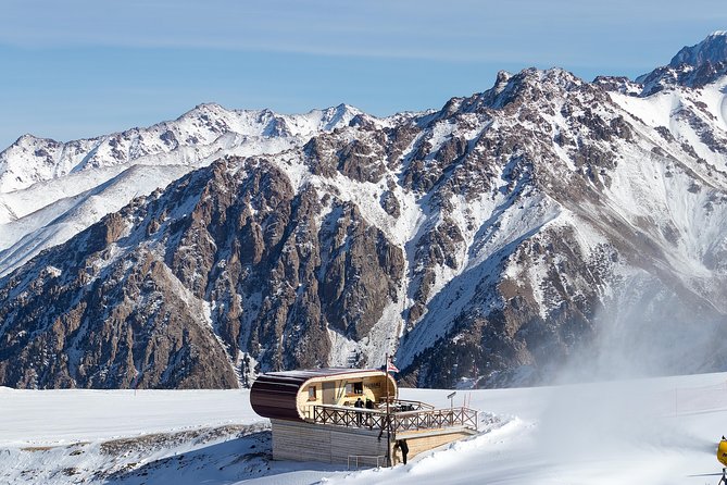 Private Trip to Medeu Ice Skating Rink and Shymbulak Ski Resort - Riding the cable car from Medeu to Shymbulak