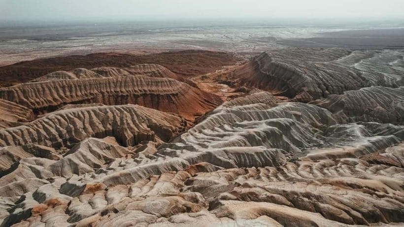 Two Day Tour to Altyn Emel: Singing Dune and Aktau Mountain - Basshi after sunset: dinner, campfire, and a shared room